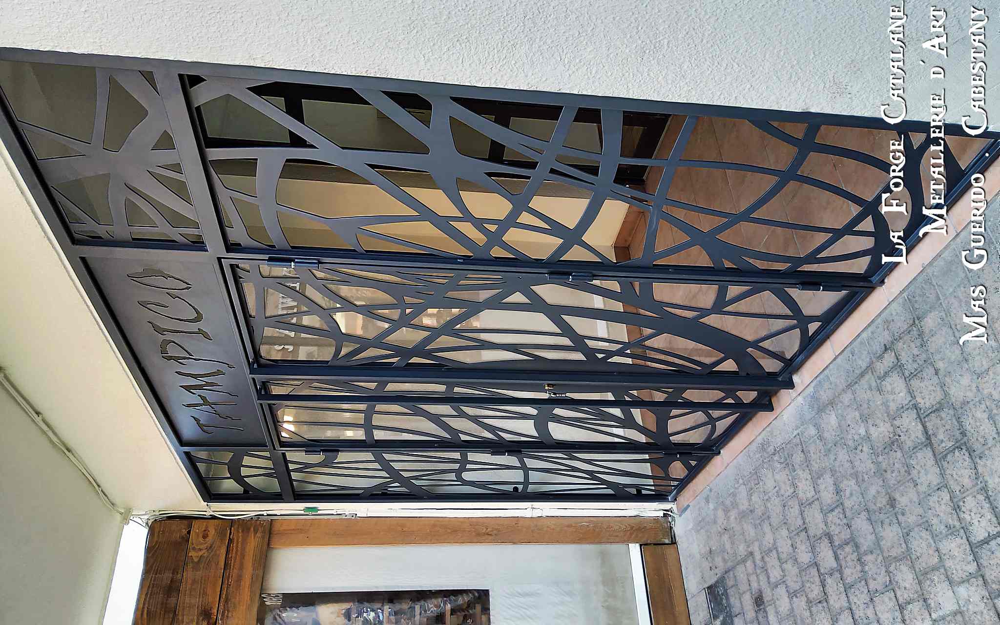 grille de protection articulee avec decoupe laser forge catalane 1.jpg